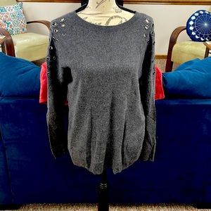 Cold shoulder sweater w cool metal embellishments on shoulders